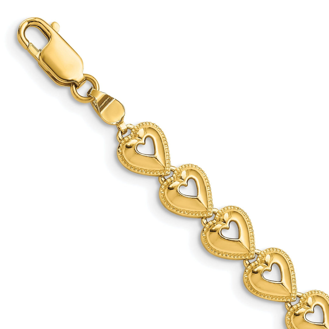 14K yellow gold Beaded Hearts design Bracelet lobster clasp. 7-inch
