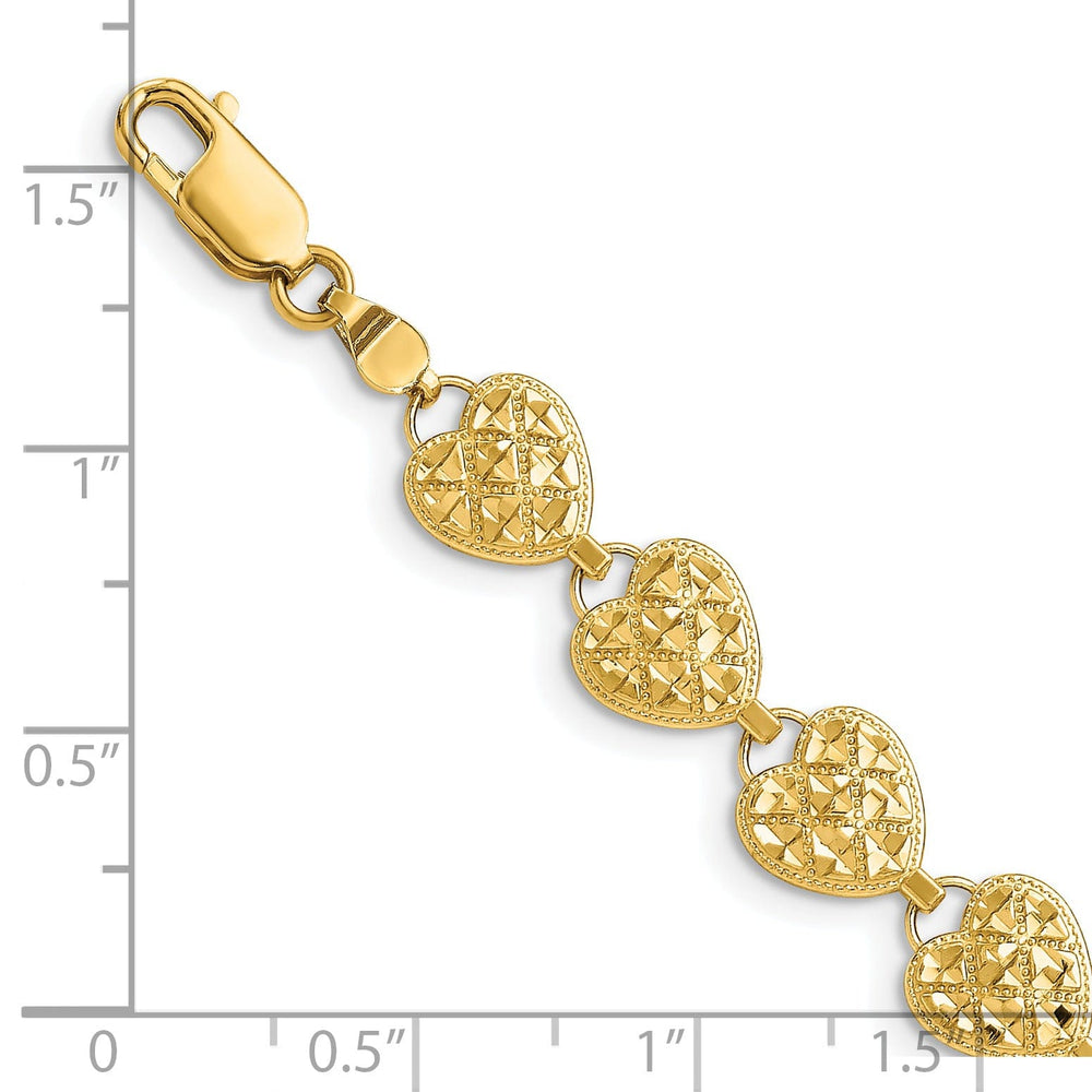 14K Yellow Gold Hearts Bracelet. Textured D.C finish, 7.5-inch