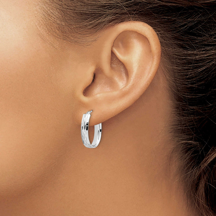 10kt White Gold D.C Oval Hinged Hoop Earrings