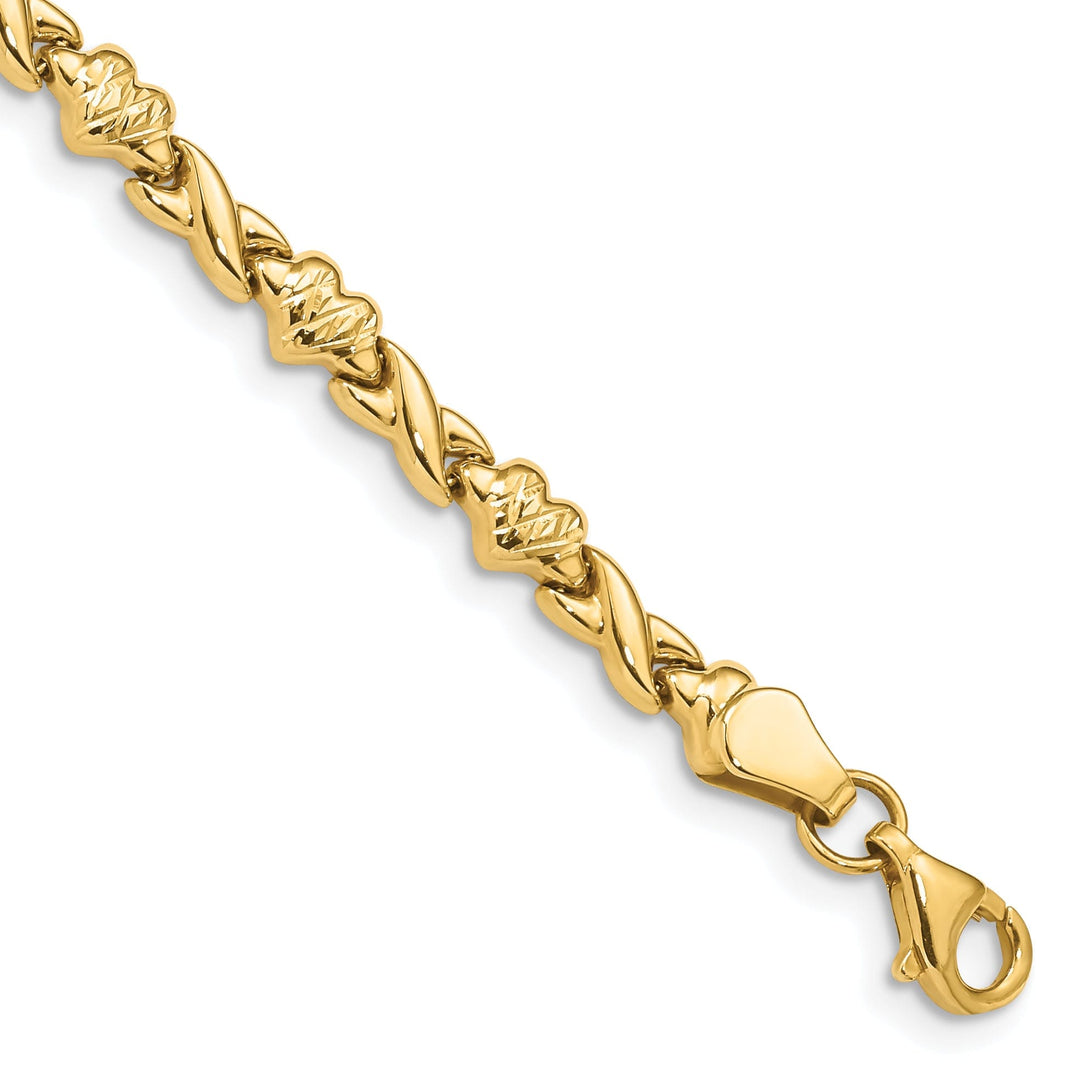 14k yellow gold bracelet X and Heart Design. 7-inch