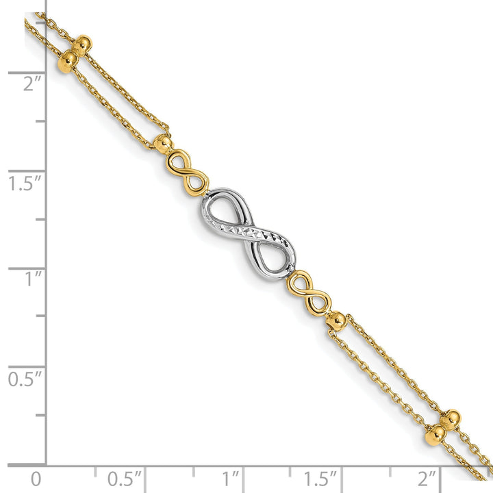 14K two-tone gold bracelet multi-strand infinity design. 7.5-inch