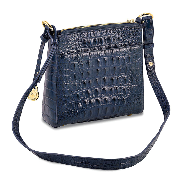 Top Grain Leather Croc Texture Zip Top with Tassel Front Swivel Clasp Compartment with Slip Pocket Clear ID and Four Card Slot Cotton Lining with Zip, Slip and Pen Pocket Key Fob Adjustable Shoulder Strap Metal Feet Navy Organizer Crossbody Bag
