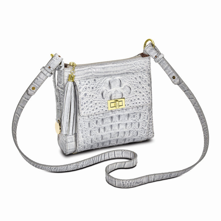 Top Grain Leather Croc Texture Zip Top with Tassel Front Swivel Clasp Compartment with Slip Pocket Clear ID and Four Card Slot Cotton Lining with Zip, Slip and Pen Pocket Key Fob Adjustable Shoulder Strap Metal Feet Silver Organizer Crossbody Bag