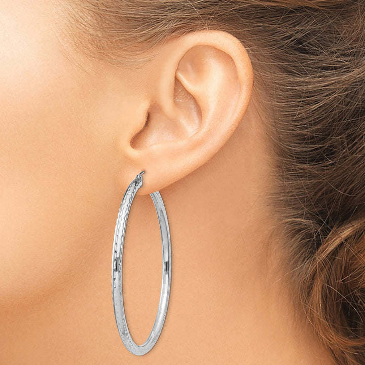 Silver D.C Hollow Hoop Hinged Back Earrings