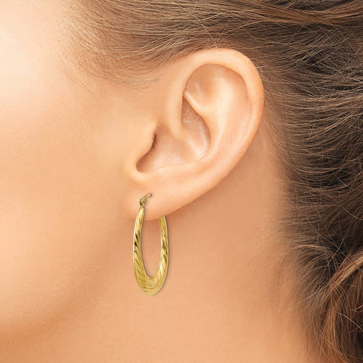 14k Yellow Gold Twisted Oval Hollow Hoop Earrings