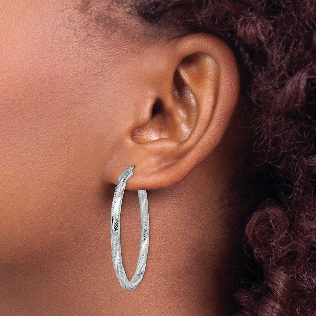 10kt White Gold Twisted Hinged Hoop Earrings
