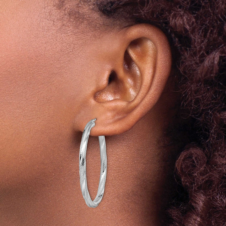 10kt White Gold Twisted Hinged Hoop Earrings